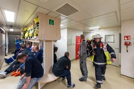 Employees on CNOOC International’s Golden Eagle offshore platform in the UK participate in an emergency exercise.